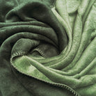 wohndecke kuscheldecke zweifarbig gruen